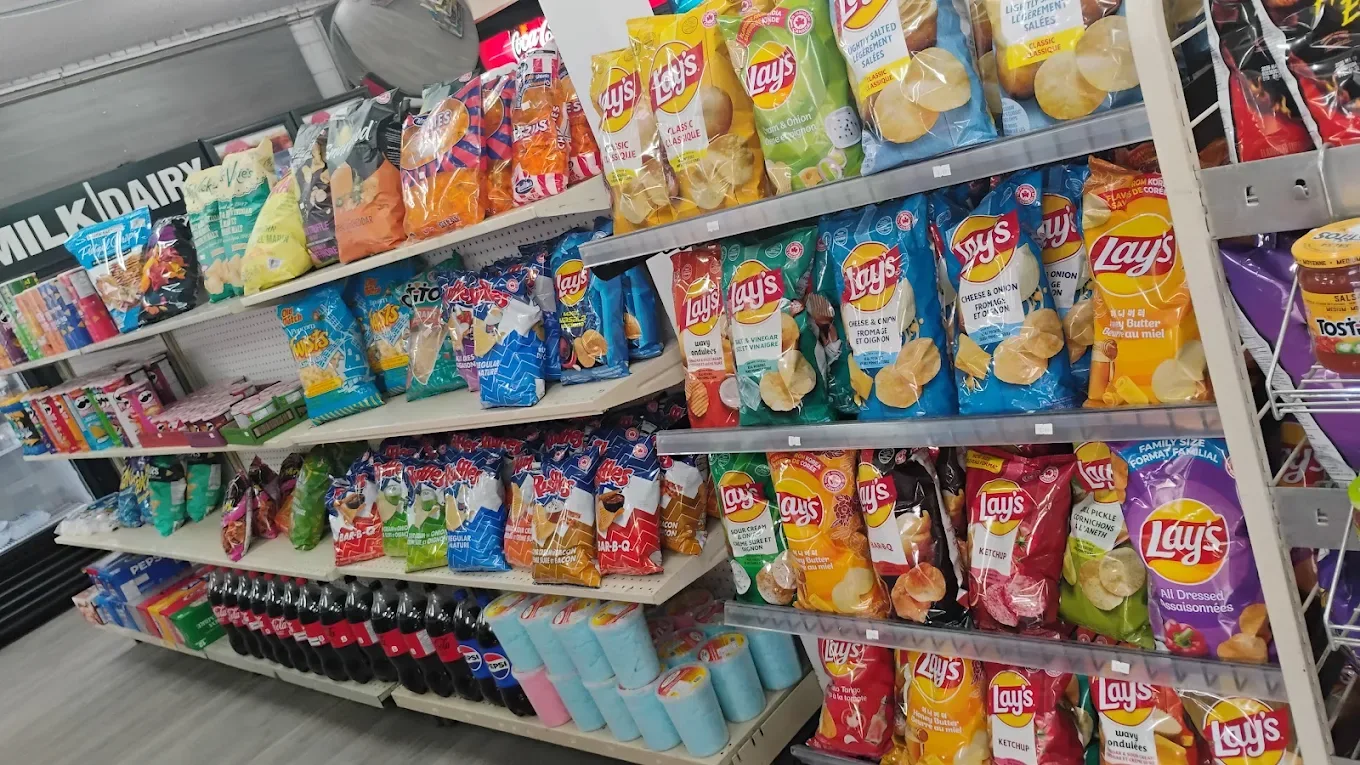 Bags of chips and salty snacks on store shelves