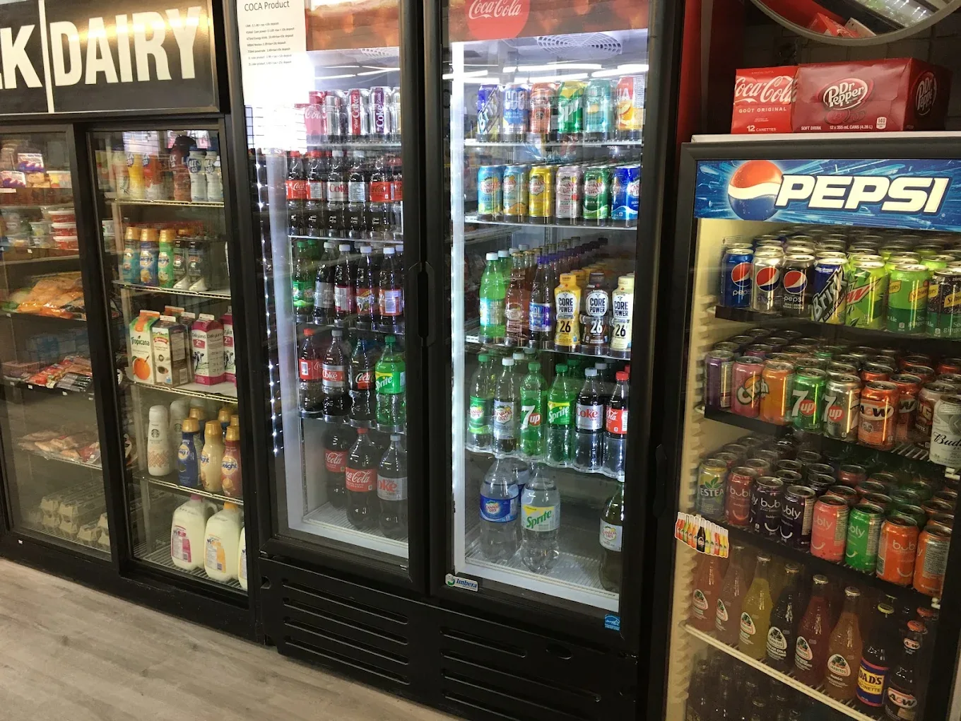 Soda and bottled drink coolers at Northmount Convenience Store