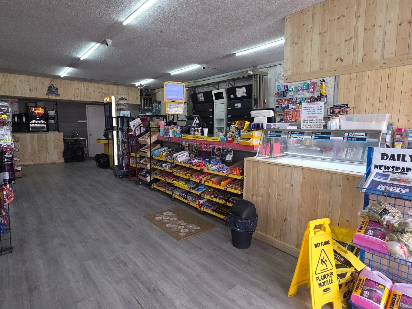 Front counter and ice cream display at Northmount Convenience Store